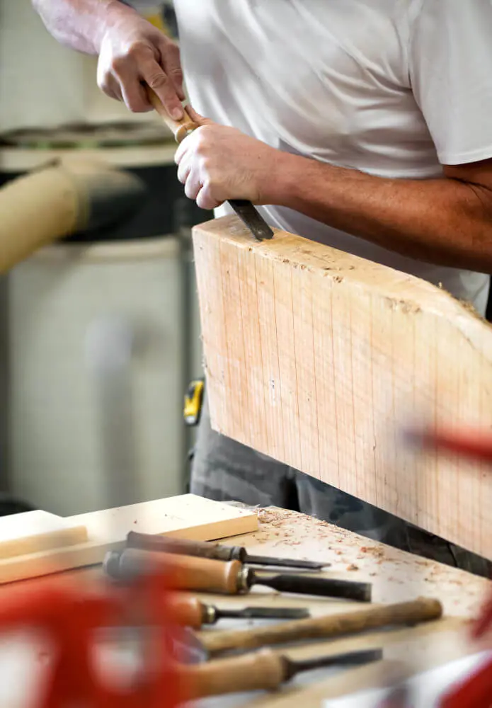 cropped-hands-carpenter-working-wood-1